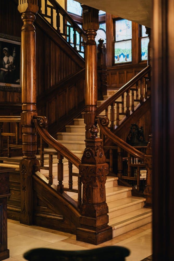 The carved staircase at Sutter Mansion, photographed from the entrance hall